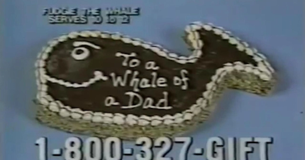 Fudgie the Whale in a Carvel Father's Day commercial — Carvel A Carvel Fudgie the Whale ice cream cake decorated “To a Whale of a Dad”