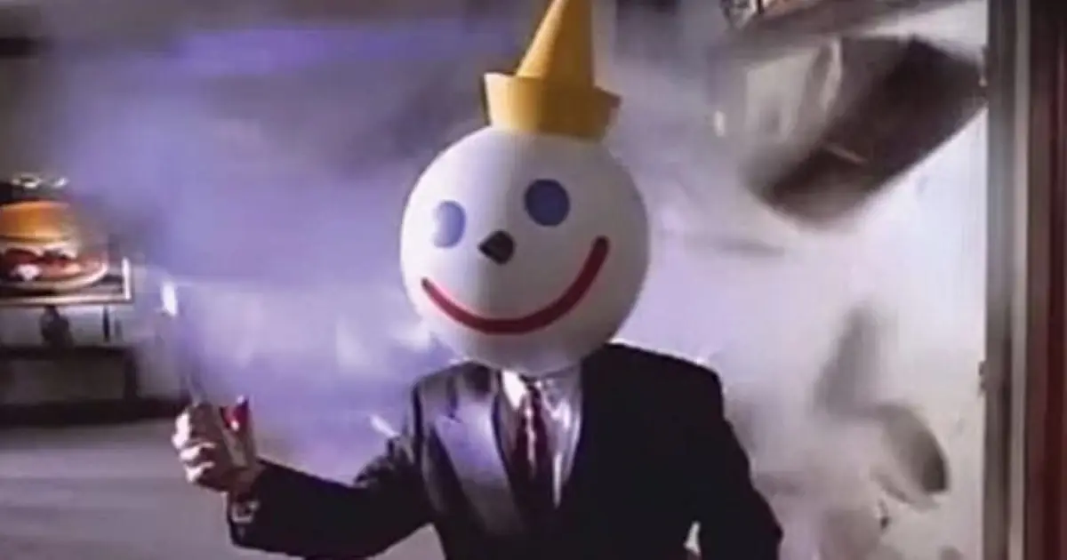 Jack’s Back: the 1994 boardroom detonation — Jack in the Box Jack Box mascot in suit amid exploding boardroom, 1994 commercial