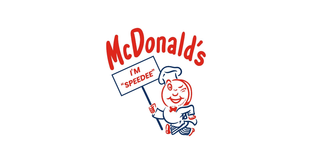 Speedee mascot, McDonald's original winking chef logo, holding an I'm Speedee sign