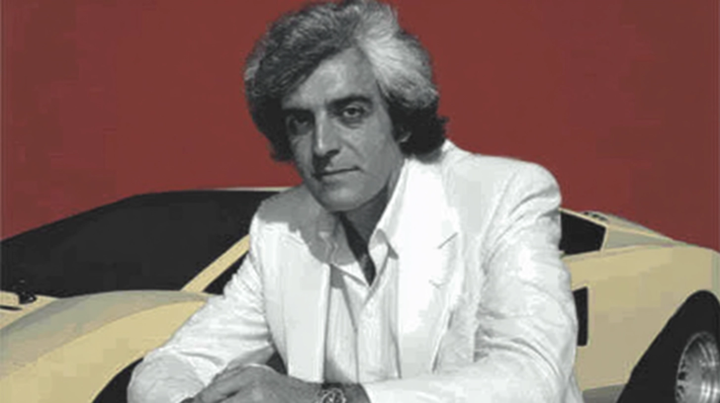 Patrick Mimran © History Oasis Man in a white suit leaning on a yellow Lamborghini Countach