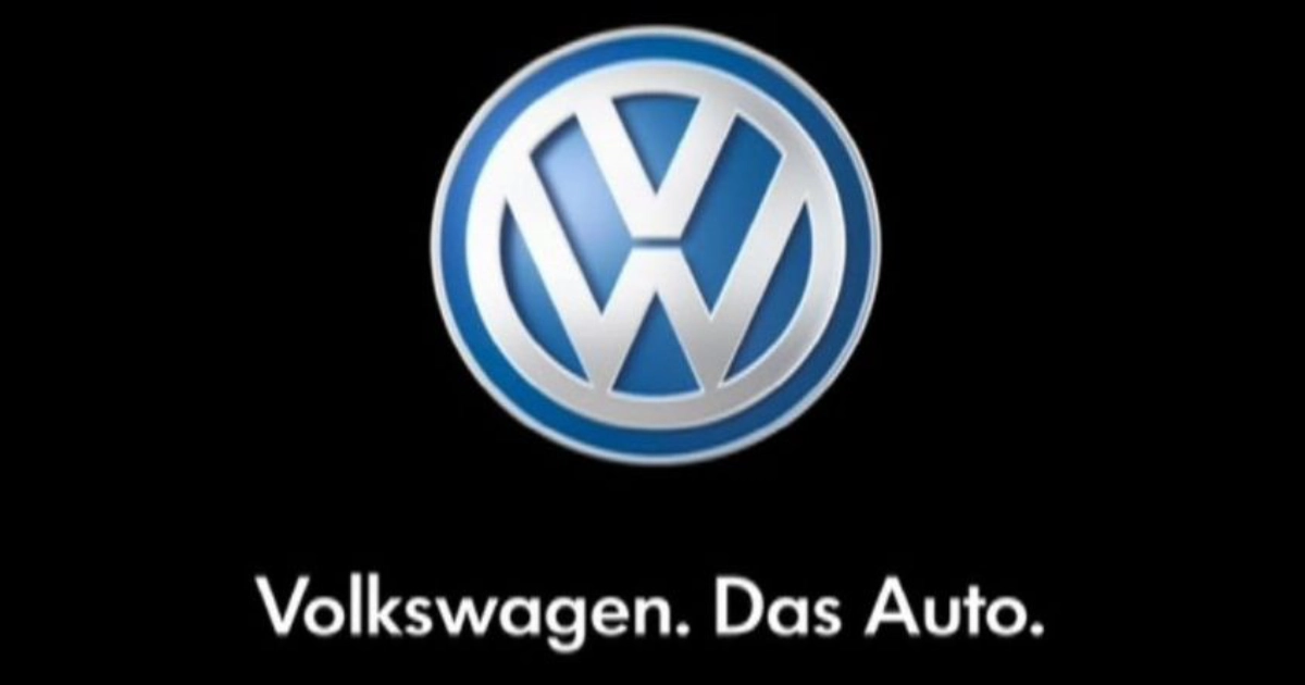 Volkswagen logo on black above the Volkswagen Das Auto tagline