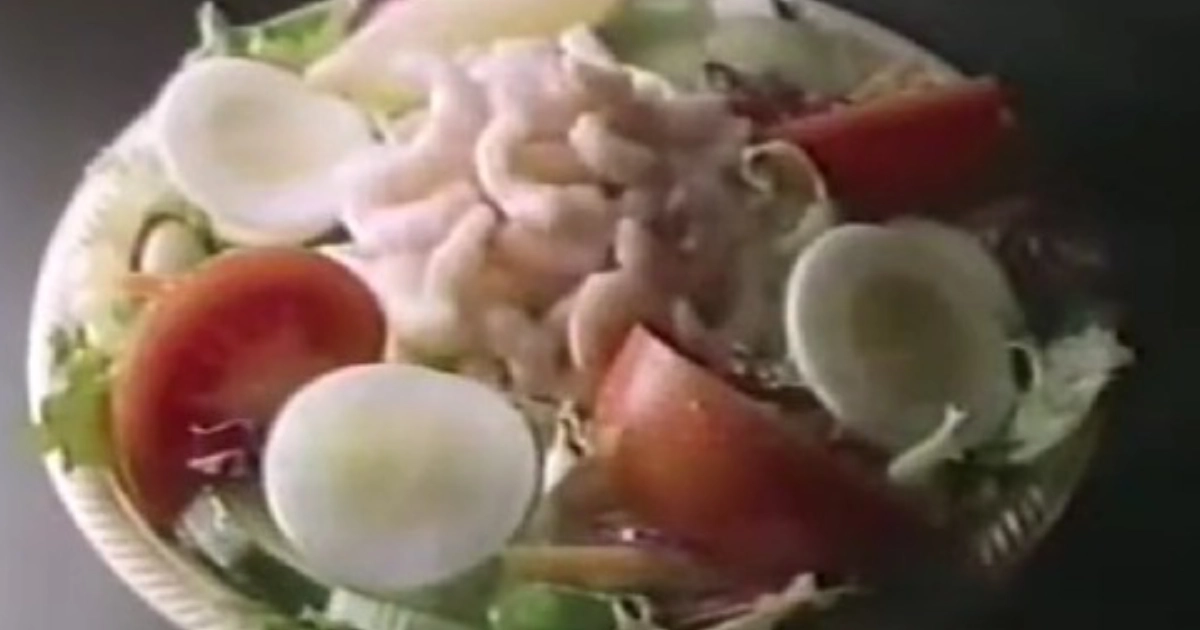 Jack In The Box Shrimp salad bowl with tomato wedges, onion, and lettuce