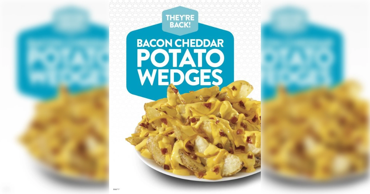 Jack In The Box Potato wedges topped with cheese sauce and bacon on poster