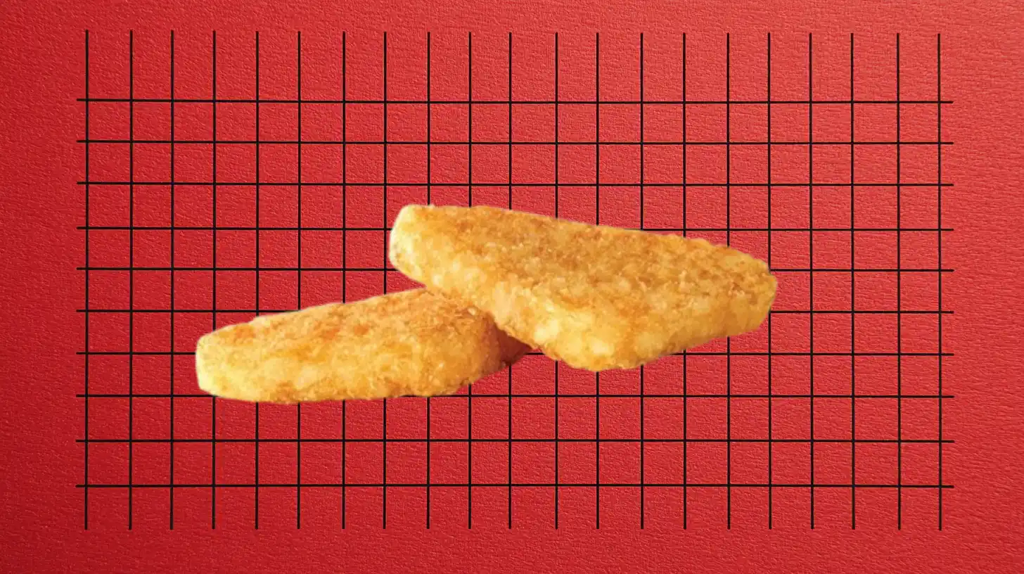 Two Arby’s Potato Cakes triangular fried hash brown patties