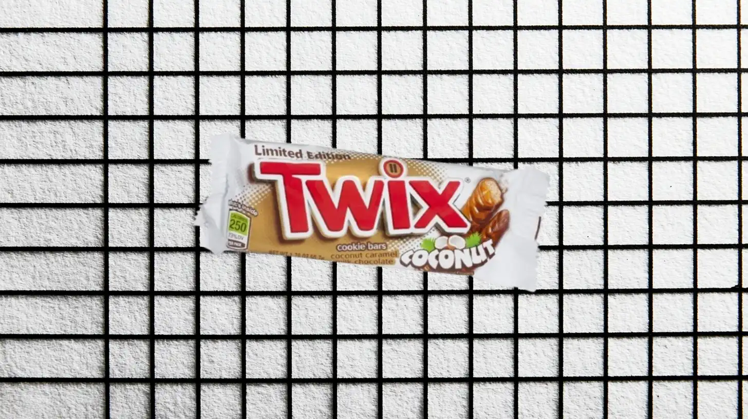 Mars, Inc. Limited Edition Twix Coconut cookie bars wrapper on white tile