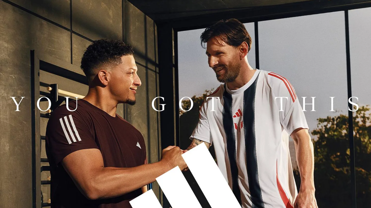 Patrick Mahomes and Lionel Messi in the You Got This campaign / Adidas Patrick Mahomes and Lionel Messi shaking hands in adidas's You Got This campaign