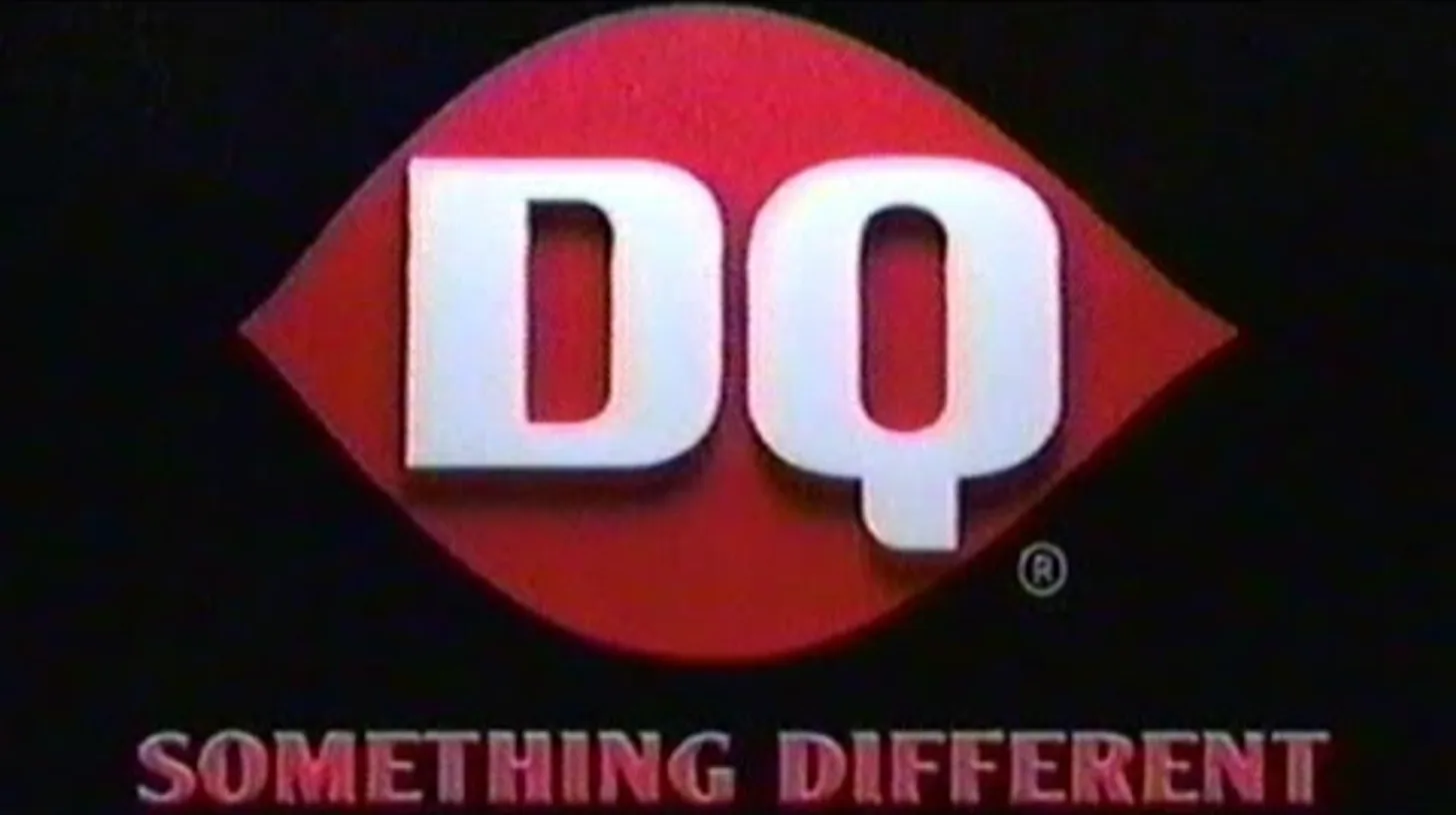 The end card from the 2004 campaign, the chain's first national advertising / Dairy Queen DQ ellipse logo above the Something Different tagline on a black commercial end card