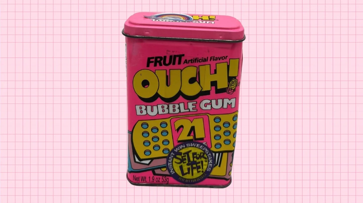 Vintage pink Ouch! bubble gum tin printed with bandages and a Set For Life sweepstakes sticker