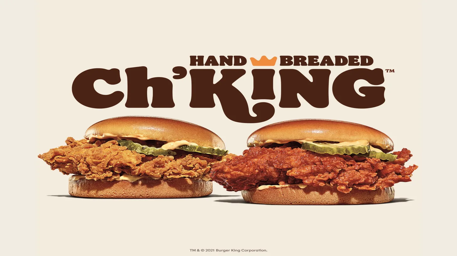 The hand-breaded Ch'King and its spicy sibling, 2021 — Burger King Burger King's Ch'King key art showing the hand-breaded regular and spicy sandwiches with pickles on potato buns