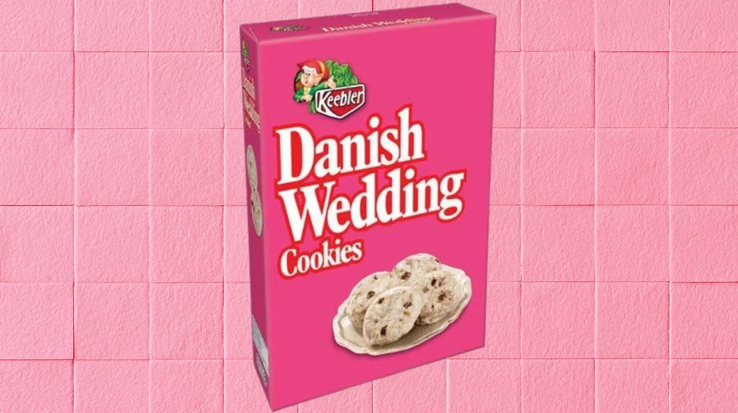 The pink Danish Wedding Cookies box—quietly pulled from shelves in 2024 — Keebler Keebler Danish Wedding Cookies box with Ernie the Elf and a plate of powdered-sugar cookies