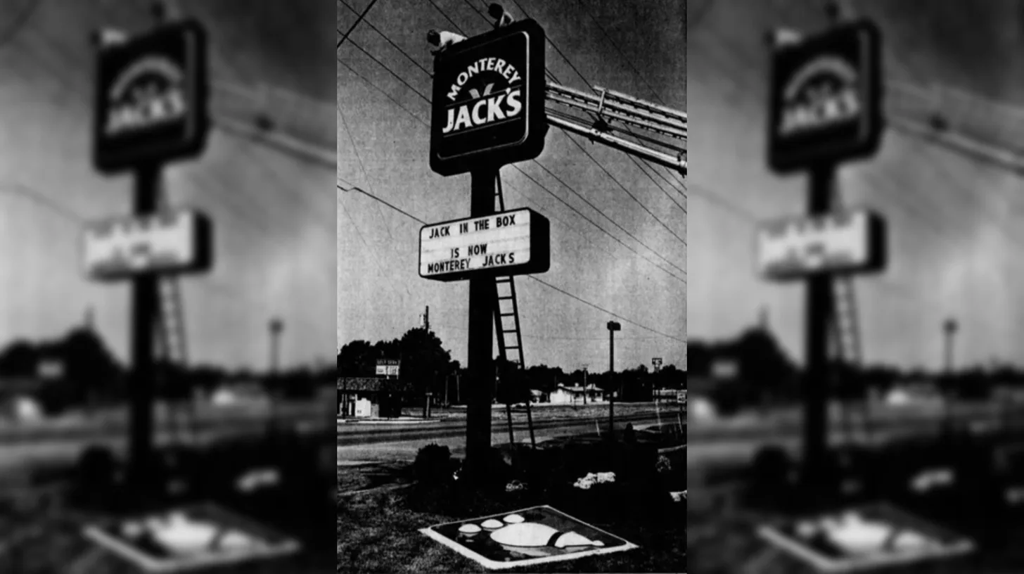 Workmen swap a Jack in the Box sign for Monterey Jack’s, St. Louis, 1985 — Renyold Ferguson/St. Louis Post-Dispatch 1985 newspaper photo of workmen converting a Jack in the Box sign to Monterey Jack's