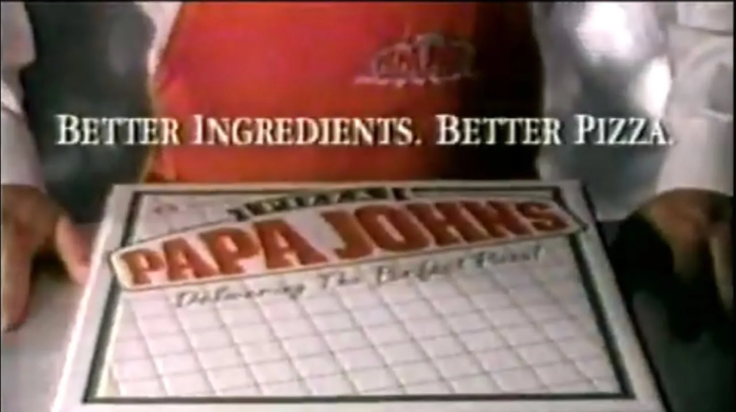 The slogan over the old box design in a 1990s TV spot / Papa John's Better Ingredients Better Pizza slogan over a Papa John's pizza box in a 1990s TV commercial